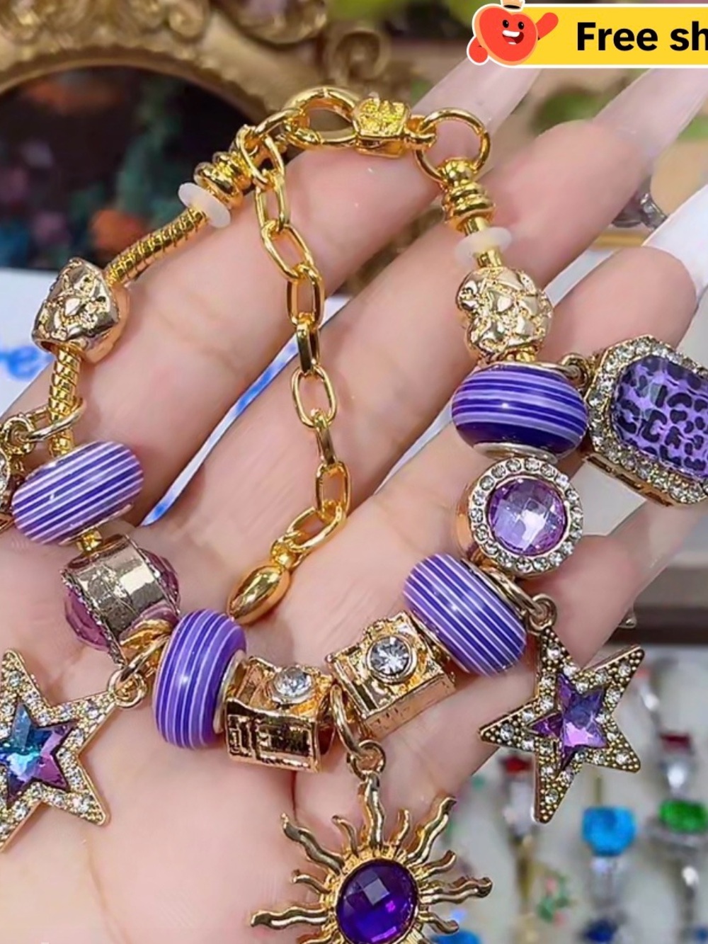 Gold-Tone Purple Charm Bracelet with Sun & Star Accents